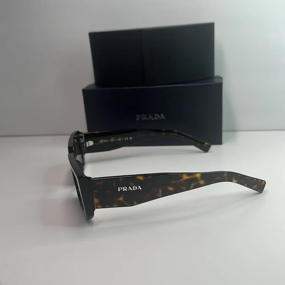 Prada PR06YS Brown Sunglasses with Bold Frames and UV Protection